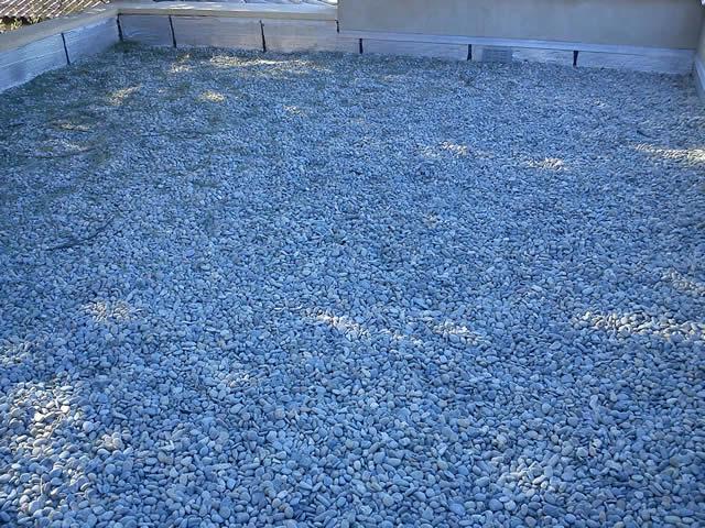 Travaux d'étanchéité toitures sous gravillons