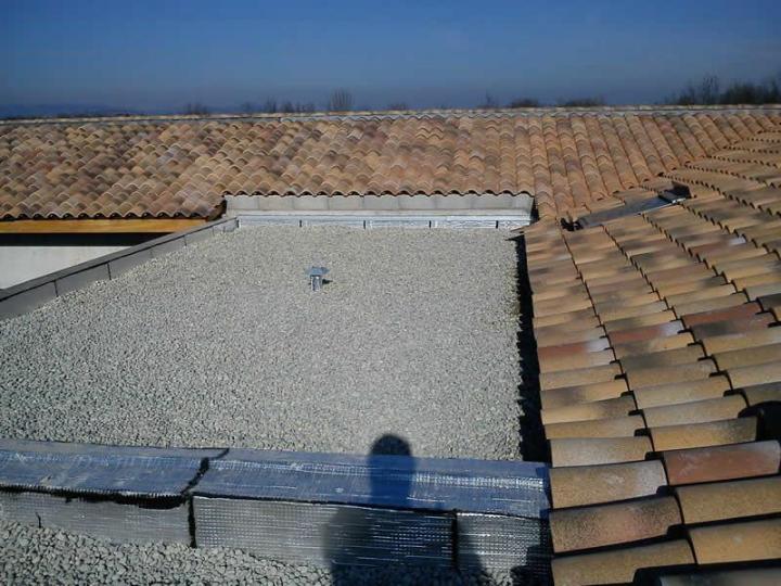 Travaux d'étanchéité toitures sous gravillons