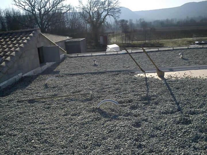 Travaux d'étanchéité toitures sous gravillons